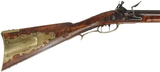 Fine Lancaster County, Pennsylvania Longrifle,
.40 caliber, 42" Green Mountain swamped barrel, 
large Siler flintlock, curly maple, brass trim,
raised carving, engraved patchbox, signed by contemporary builder R. Dietz